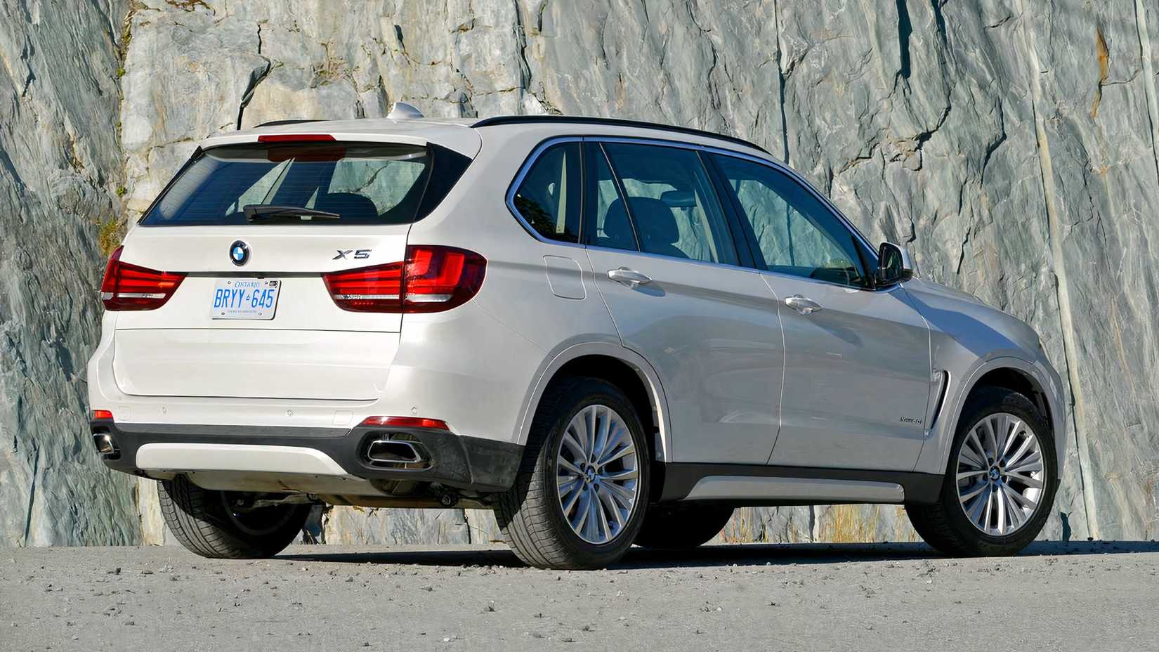 2018 BMW X5 xDrive50i in white parked