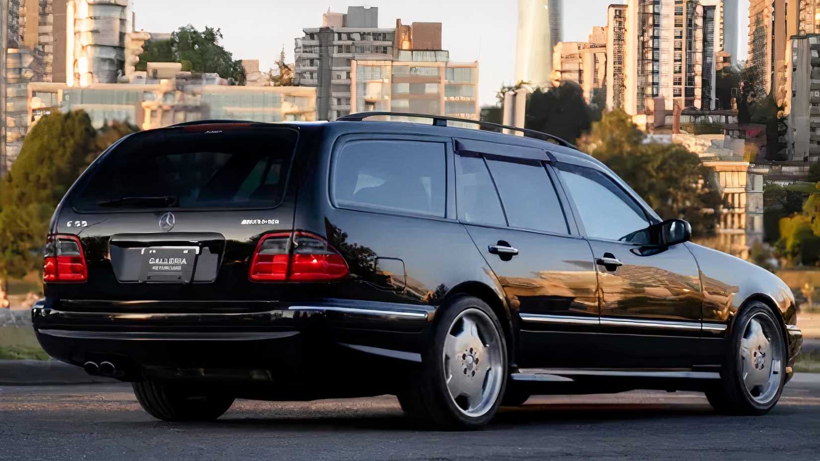 2002 Mercedes-Benz E55 AMG Wagon in black parked