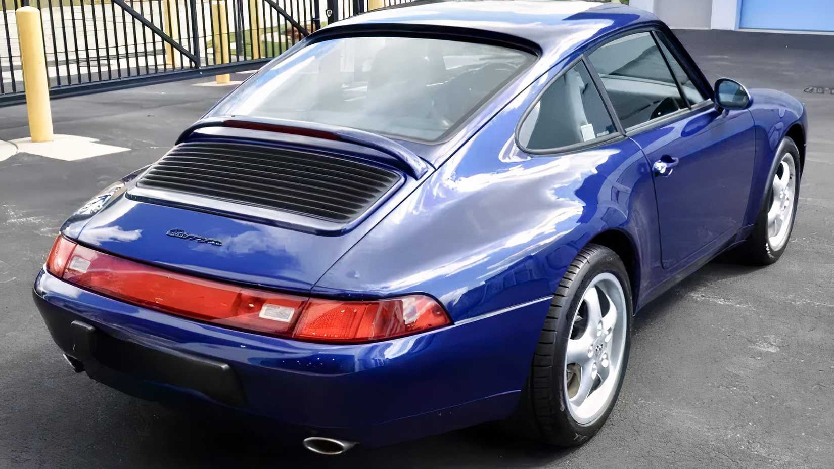 1995 Porsche 911 Carrera Coupe in blue parked