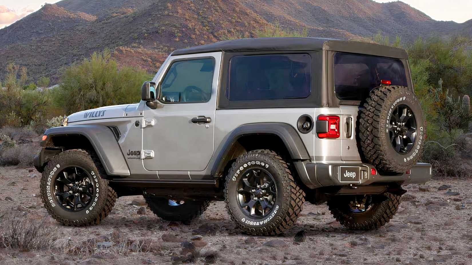2021 Jeep Wrangler Willys in silver parked off-road