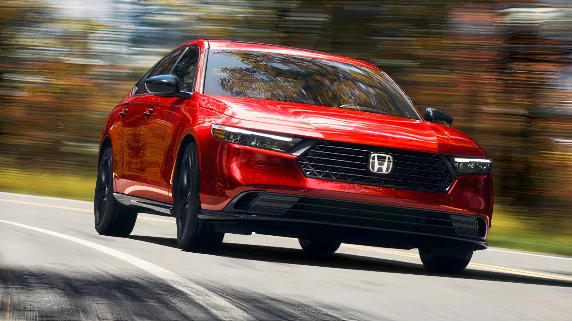 2025 Honda Accord in red being driven on road