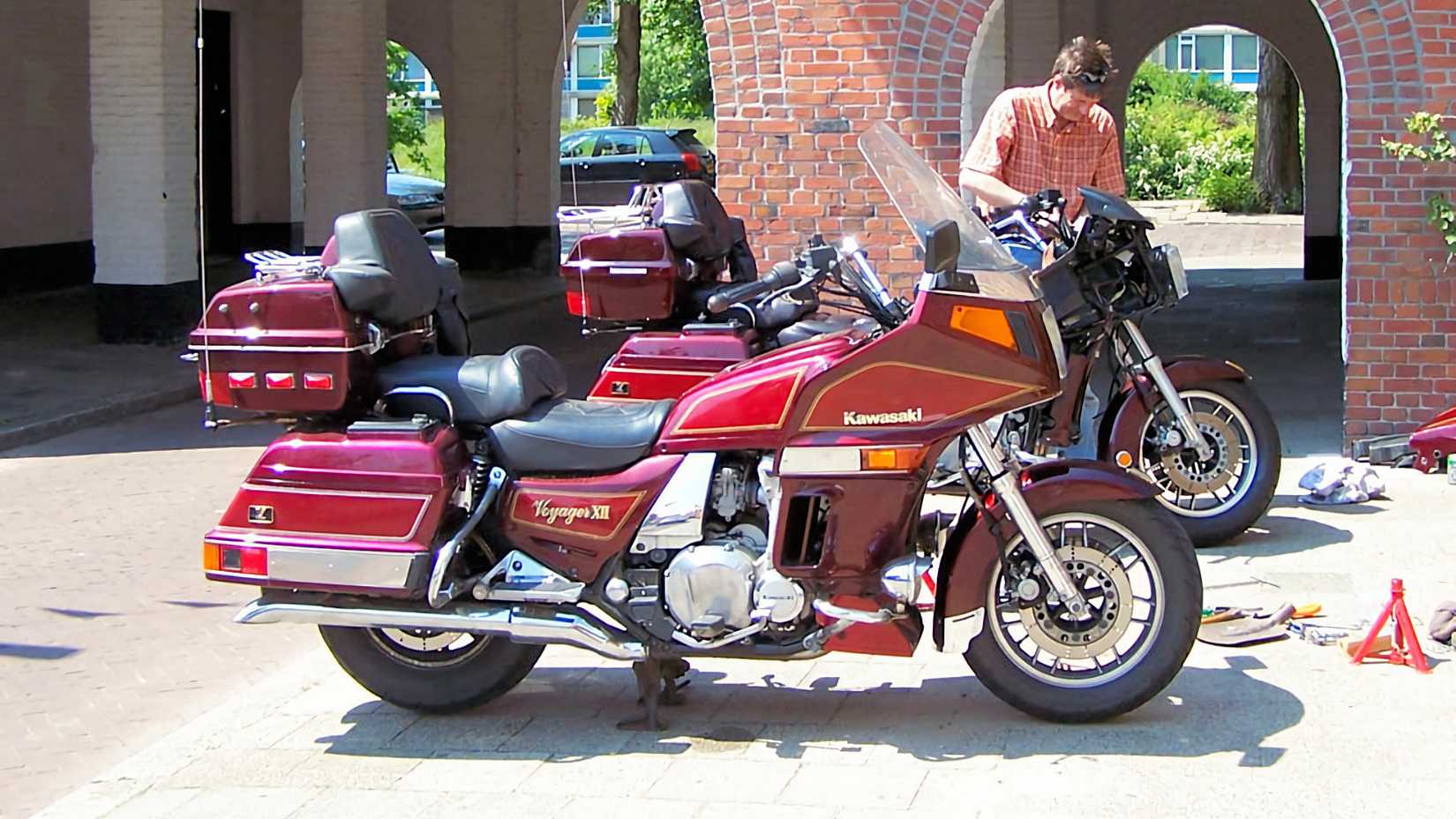 Owner next to a Kawasaki Voyager XII
