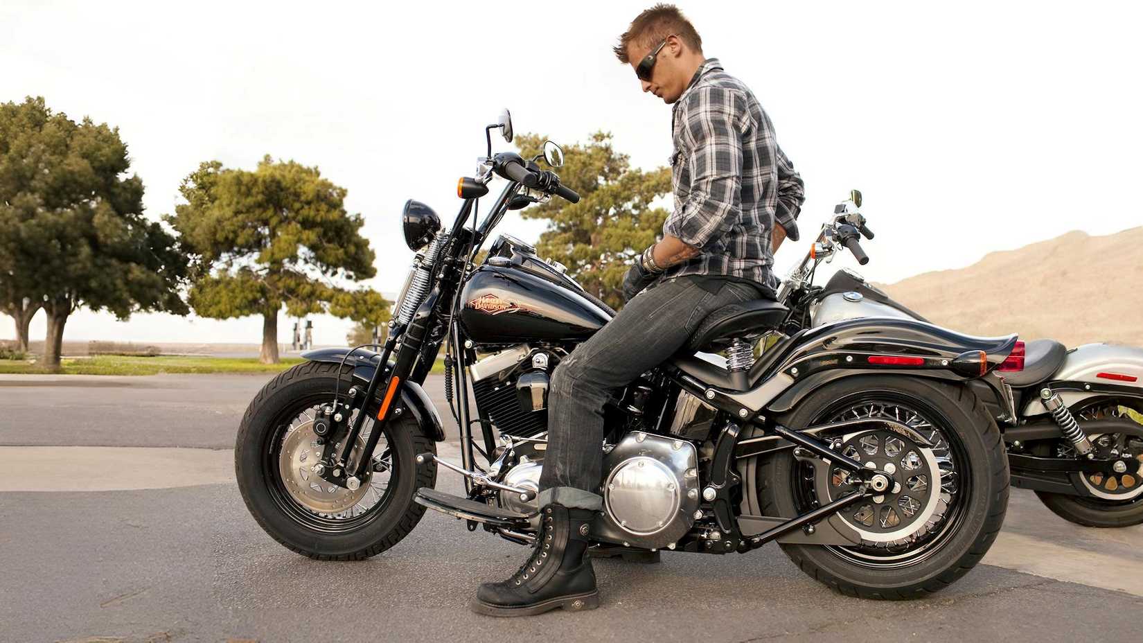 Rider sittng on a 2011 Harley-Davidson Cross Bones