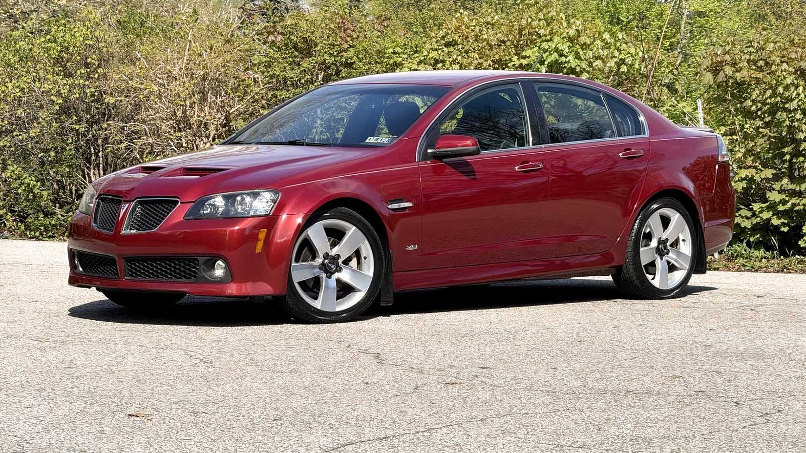 2009 Pontiac G8 GT in red parked