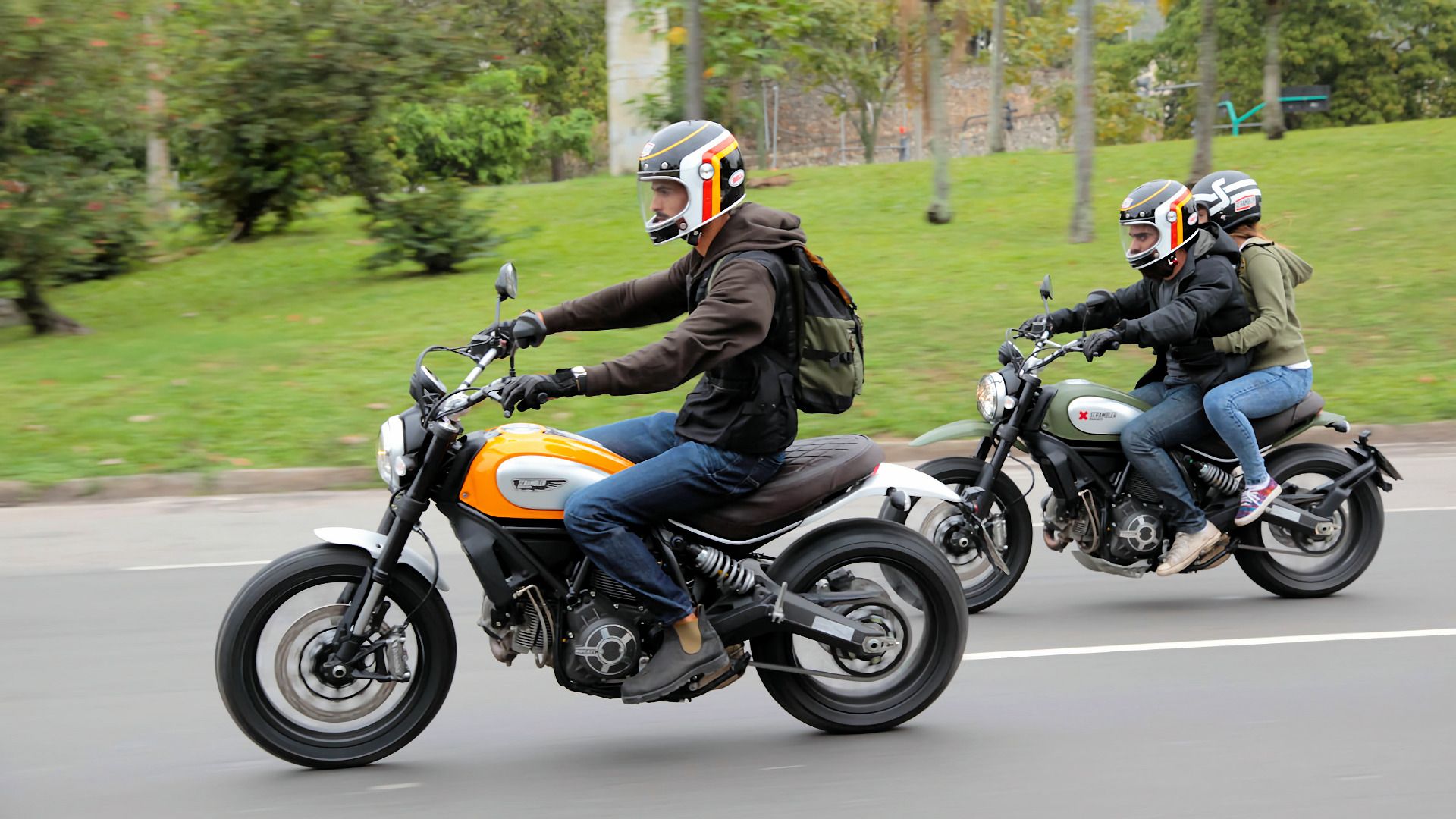 Riders on 2015 Ducati Scrambler motorcycles
