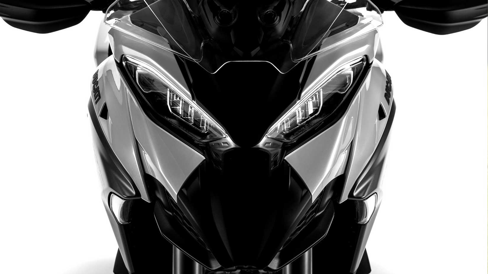 A dramatic shot of the 2025 Ducati Multistrada V4 headlight