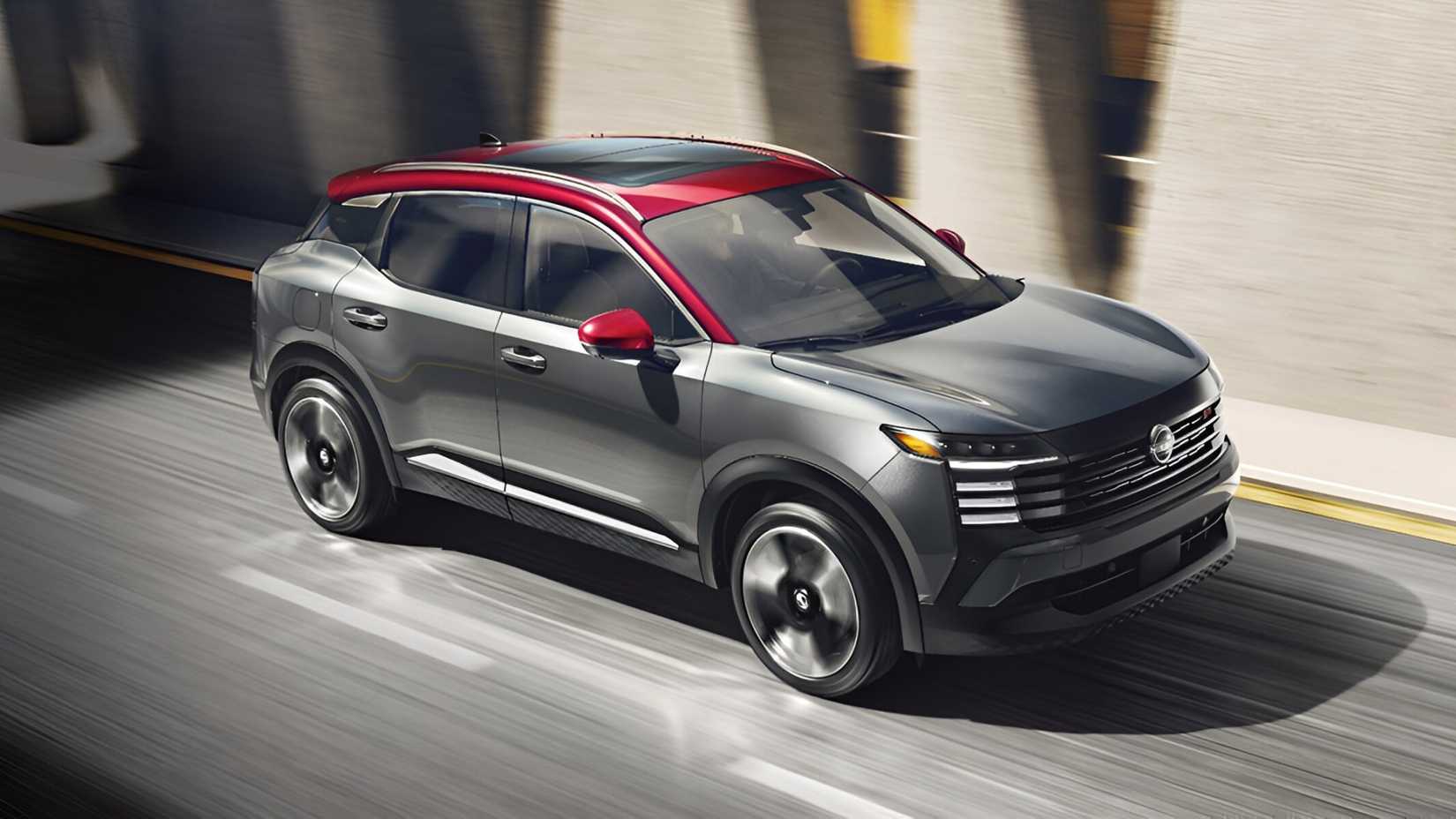 2026 Nissan Kicks dual-tone front third quarter accelerating view