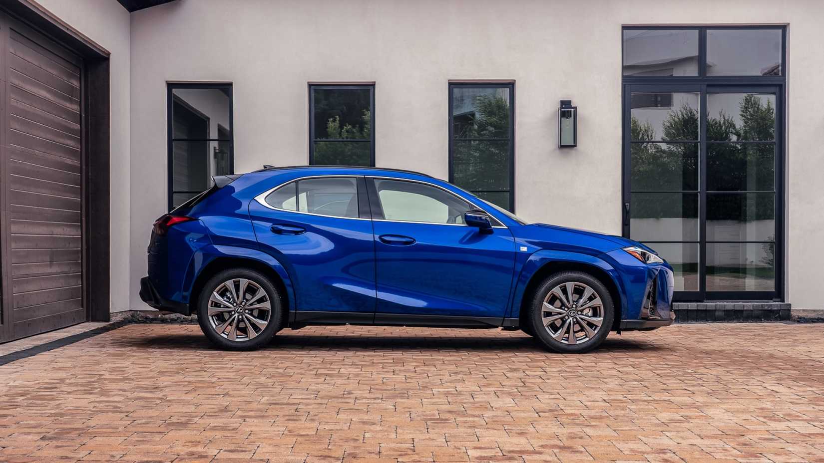 2026 Lexus UXh in blue side profile view