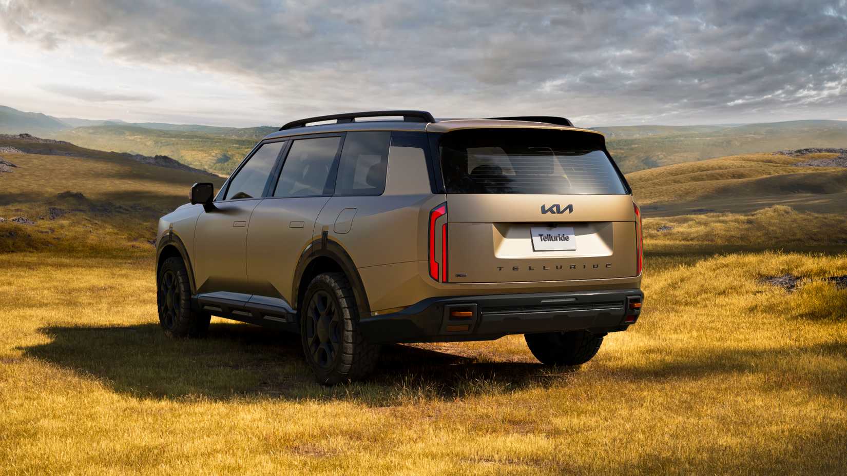 2027 Kia Telluride rear 3/4 shot parked in the grass