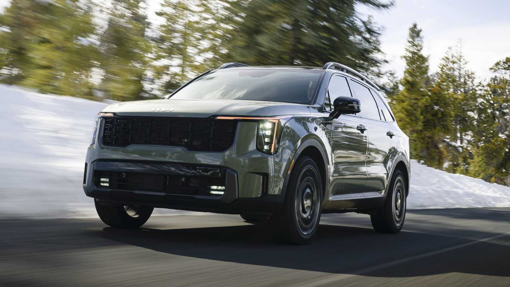 2026 Kia Sorento accelerating front third quarter view