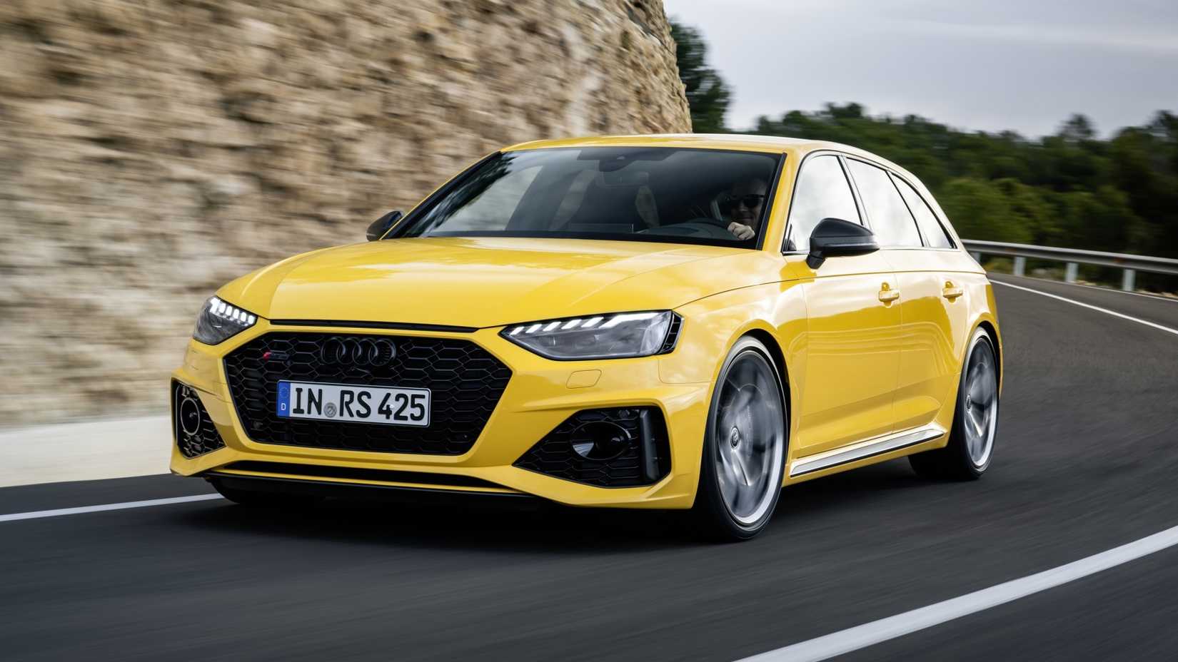 Audi RS 4 Avant in yellow design front third quarter view