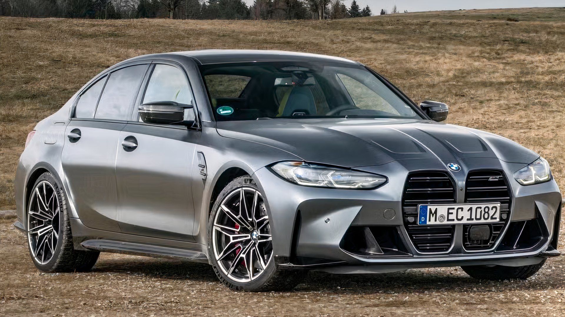 2022 BMW M3 Competition front 3/4 shot parked off-road