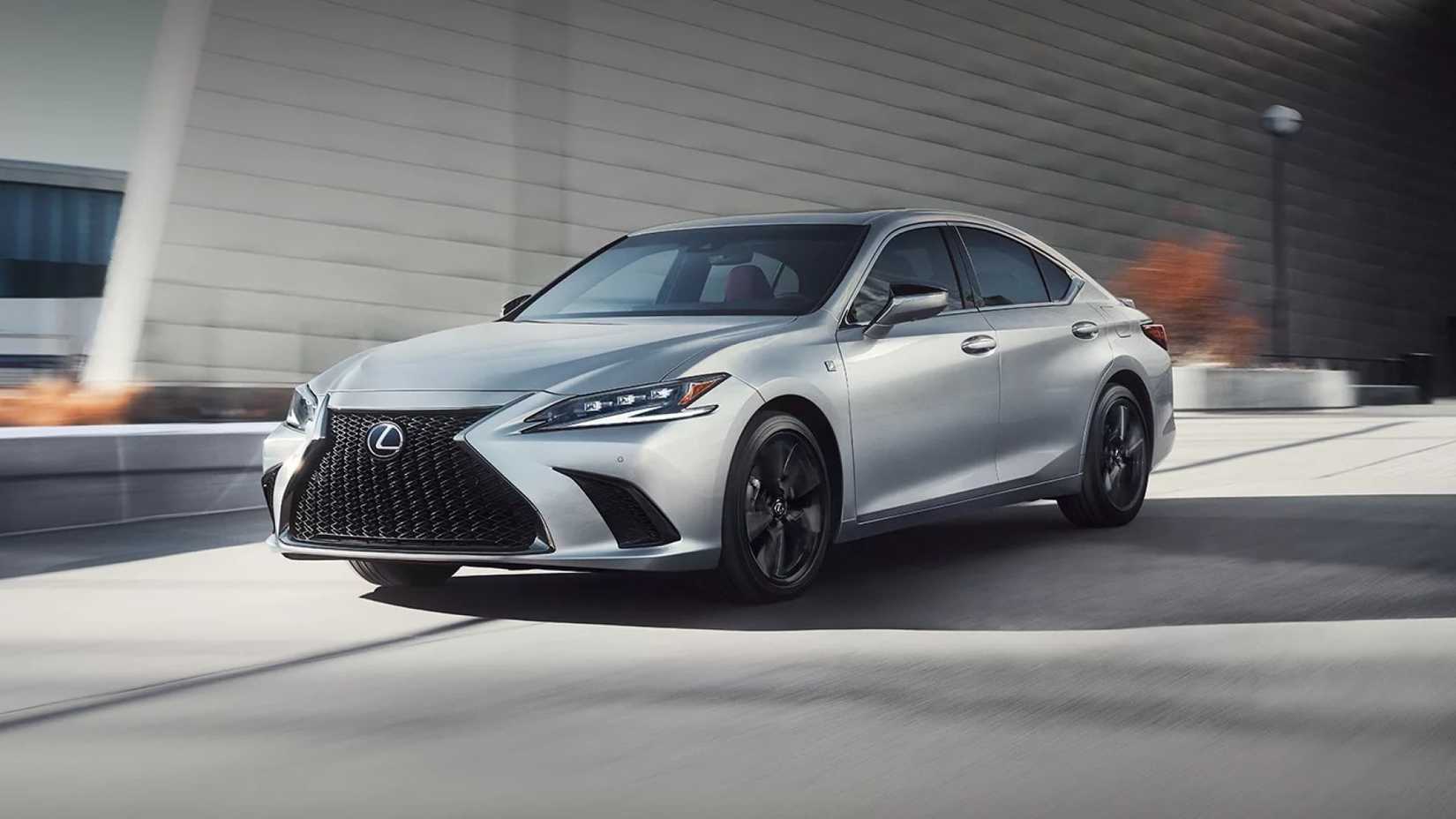 2025 Lexus ES front third quarter view driving through city