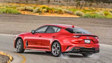 2021 Kia Stinger in red being driven
