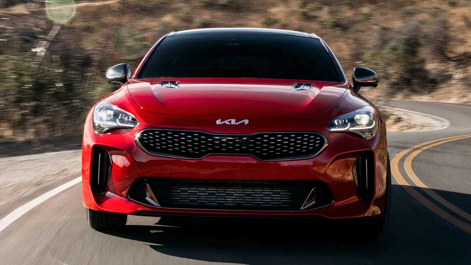 2023 Kia Stinger GT2 in red being driven