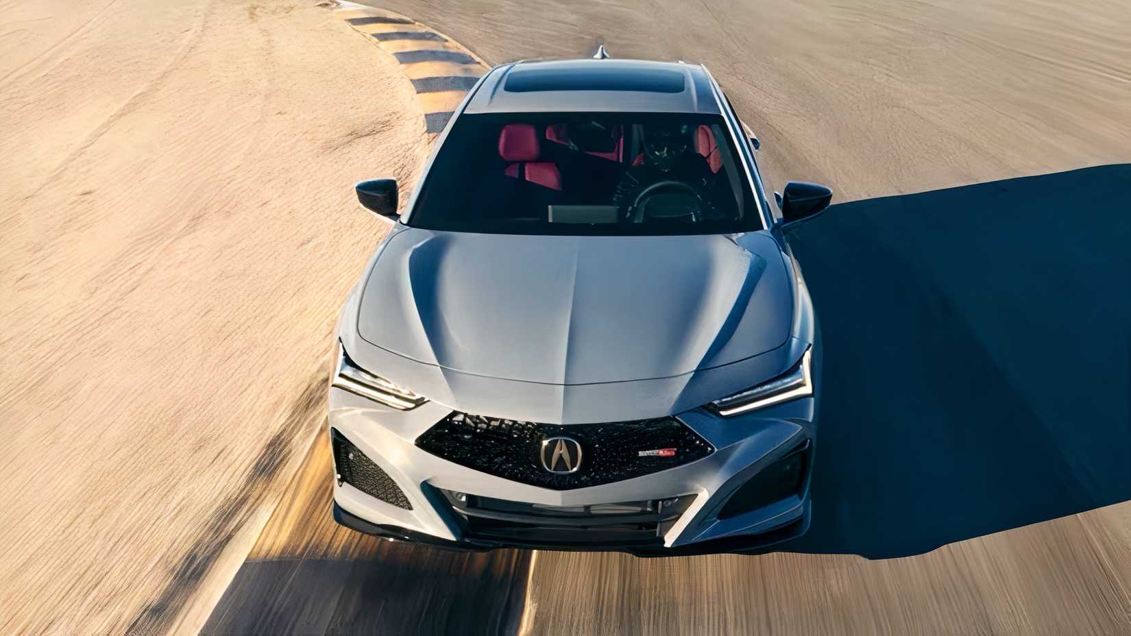 2025 Acura TLX in silver being driven