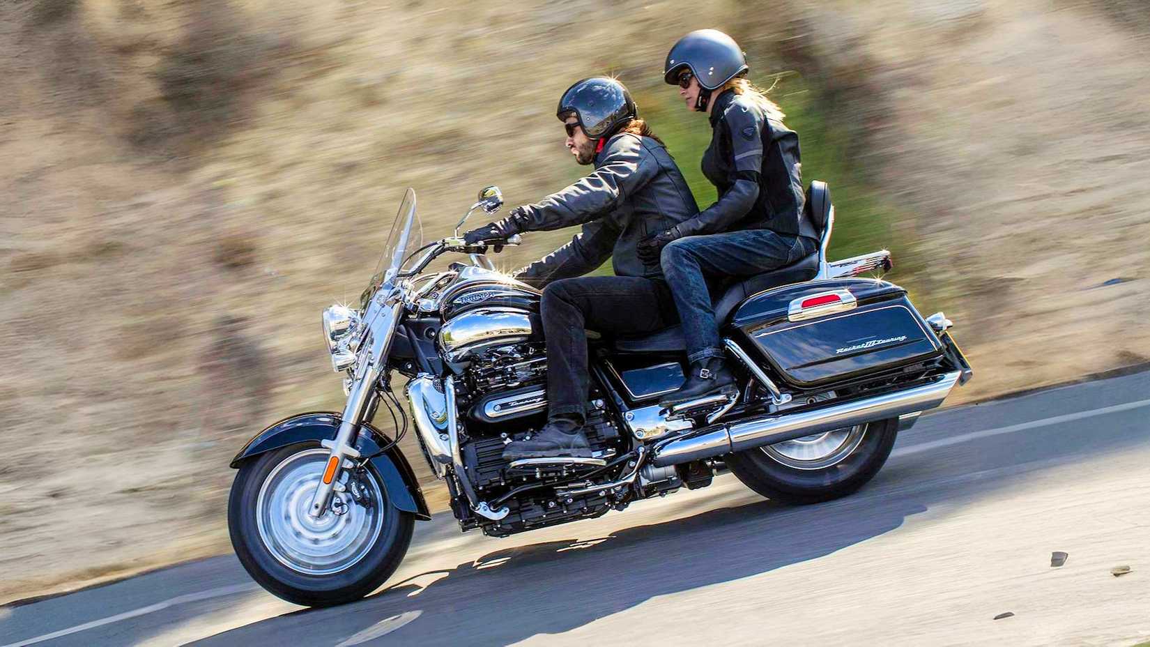Rider and passenger on a 2018 Triumph Rocket III Roadster