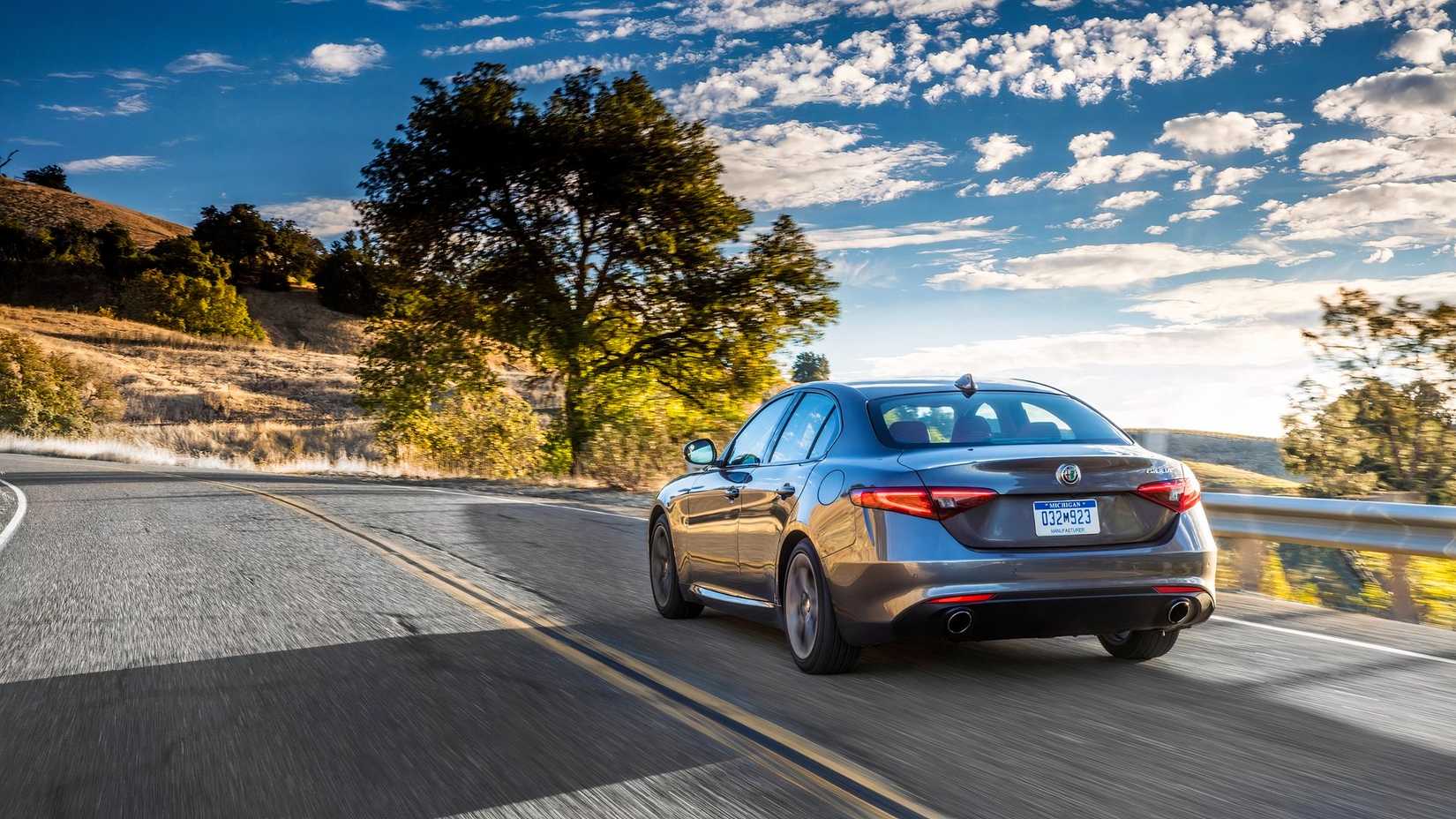 2019 Alfa Romeo Giulia rear 3/4 view driving