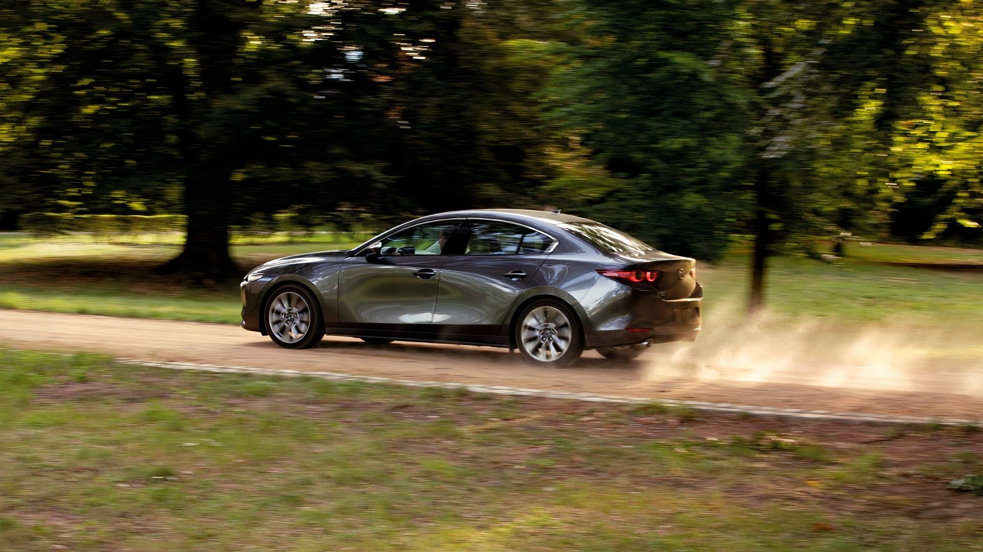2024 Mazda Mazda3 side view driving