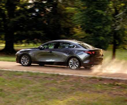 2024 Mazda Mazda3 side view driving