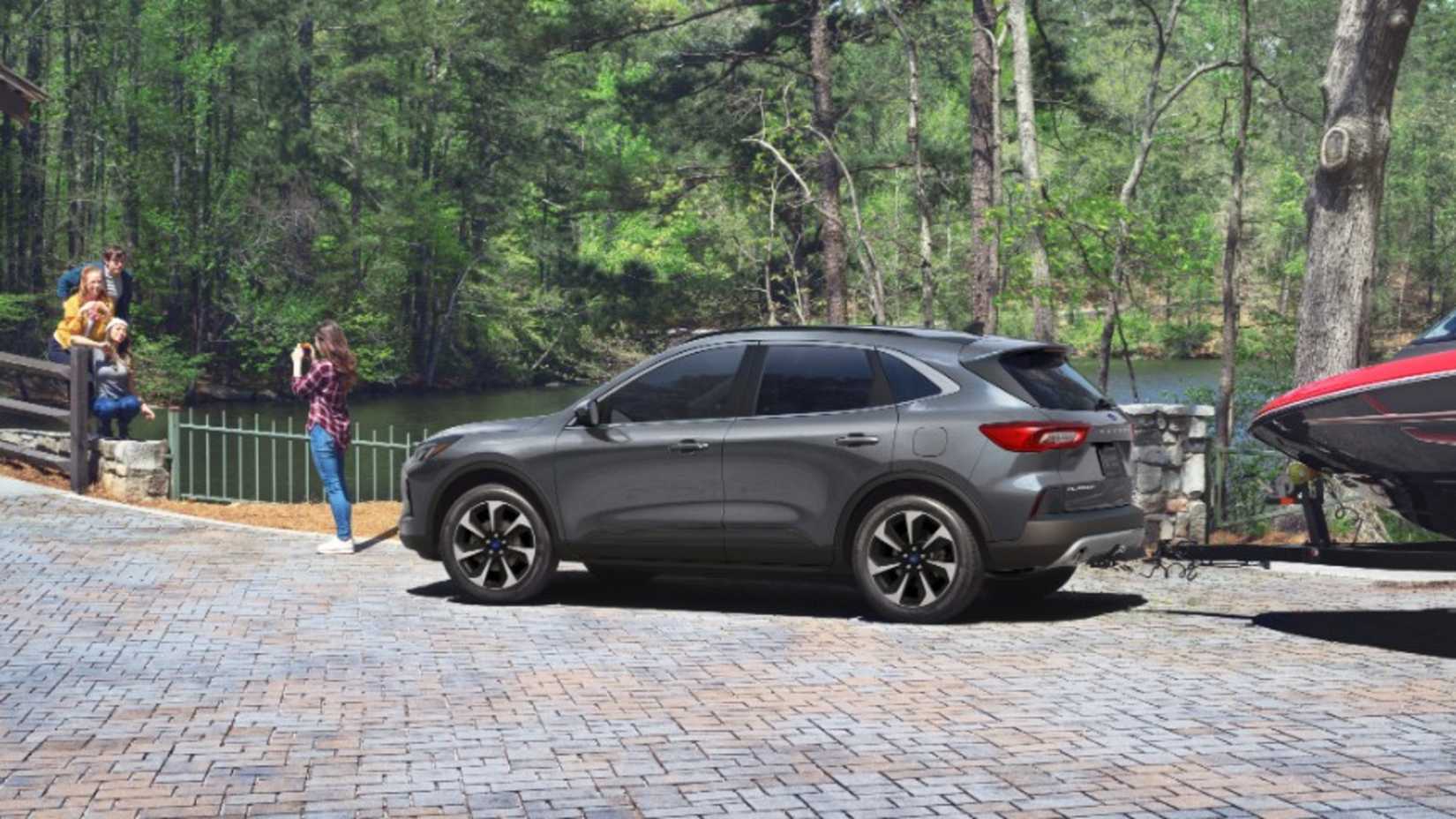 2025 Ford Escape side shot towing boat