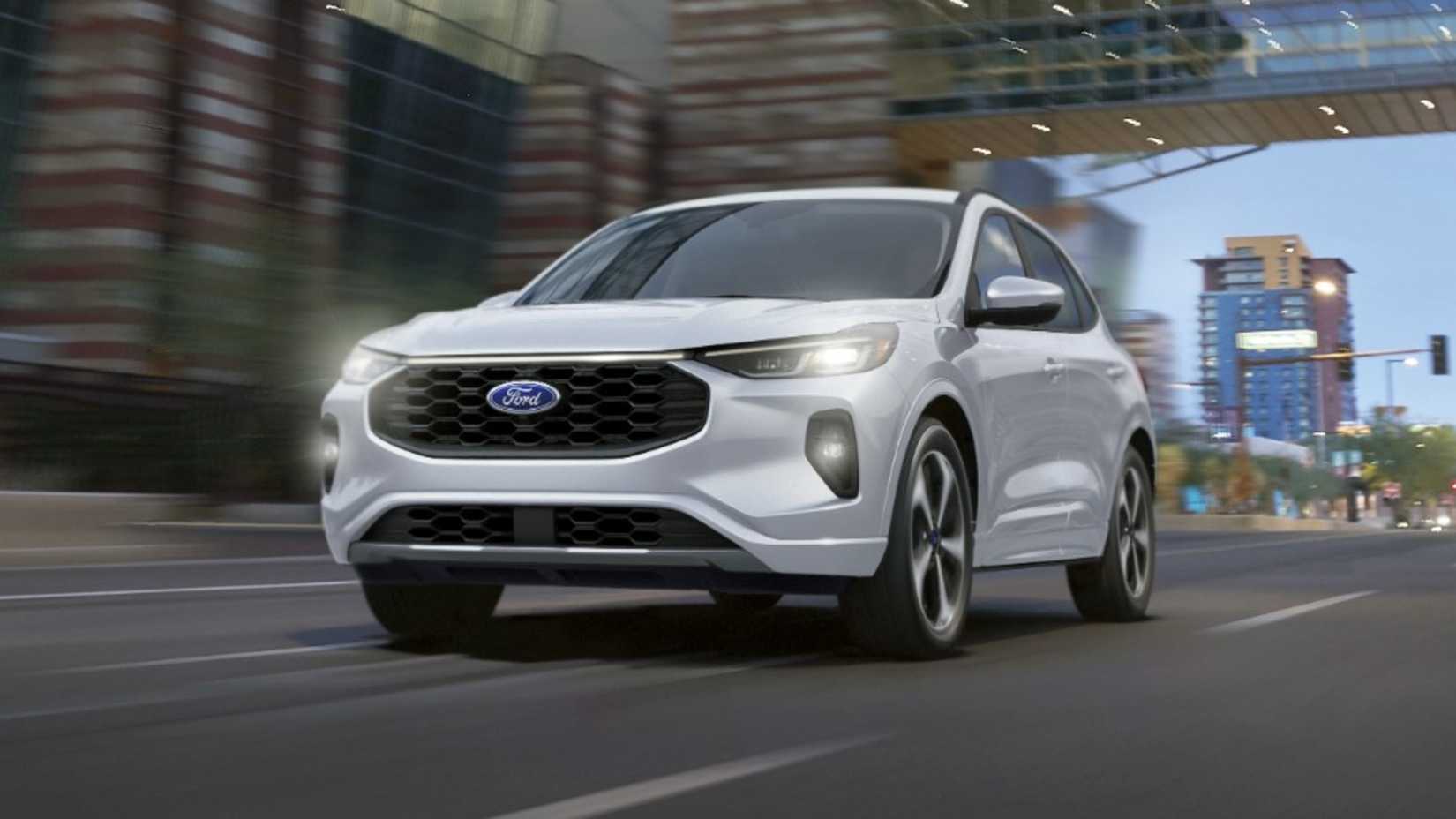 2025 Ford Escape front driving shot in city