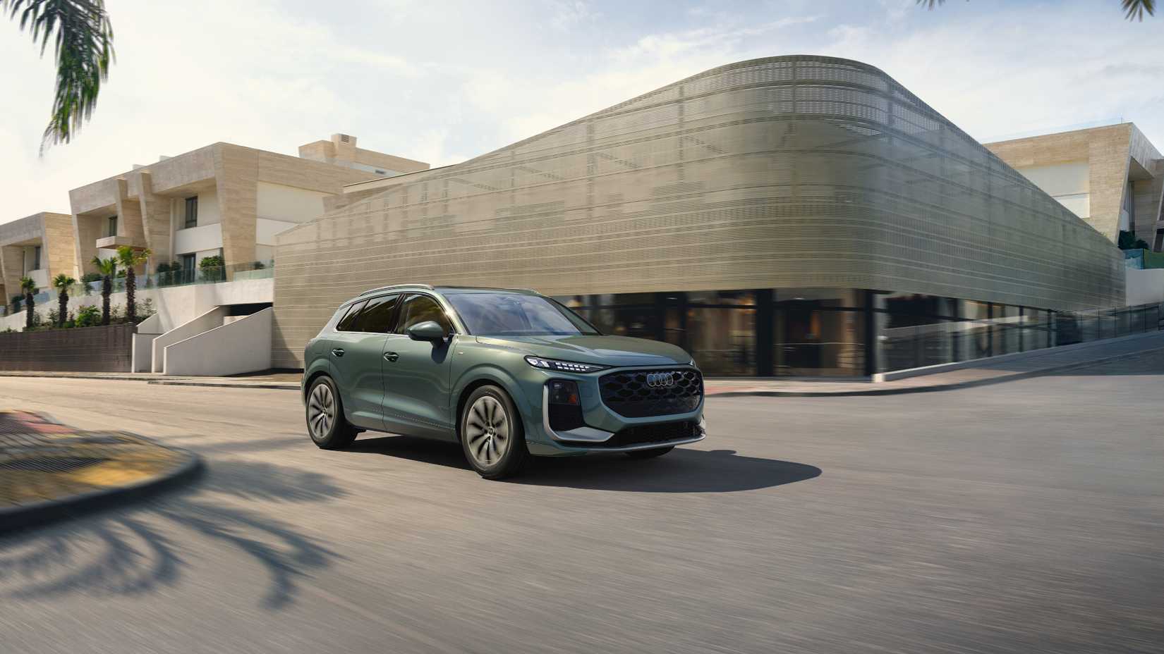 2026-audi-q3-exterior-front-driving