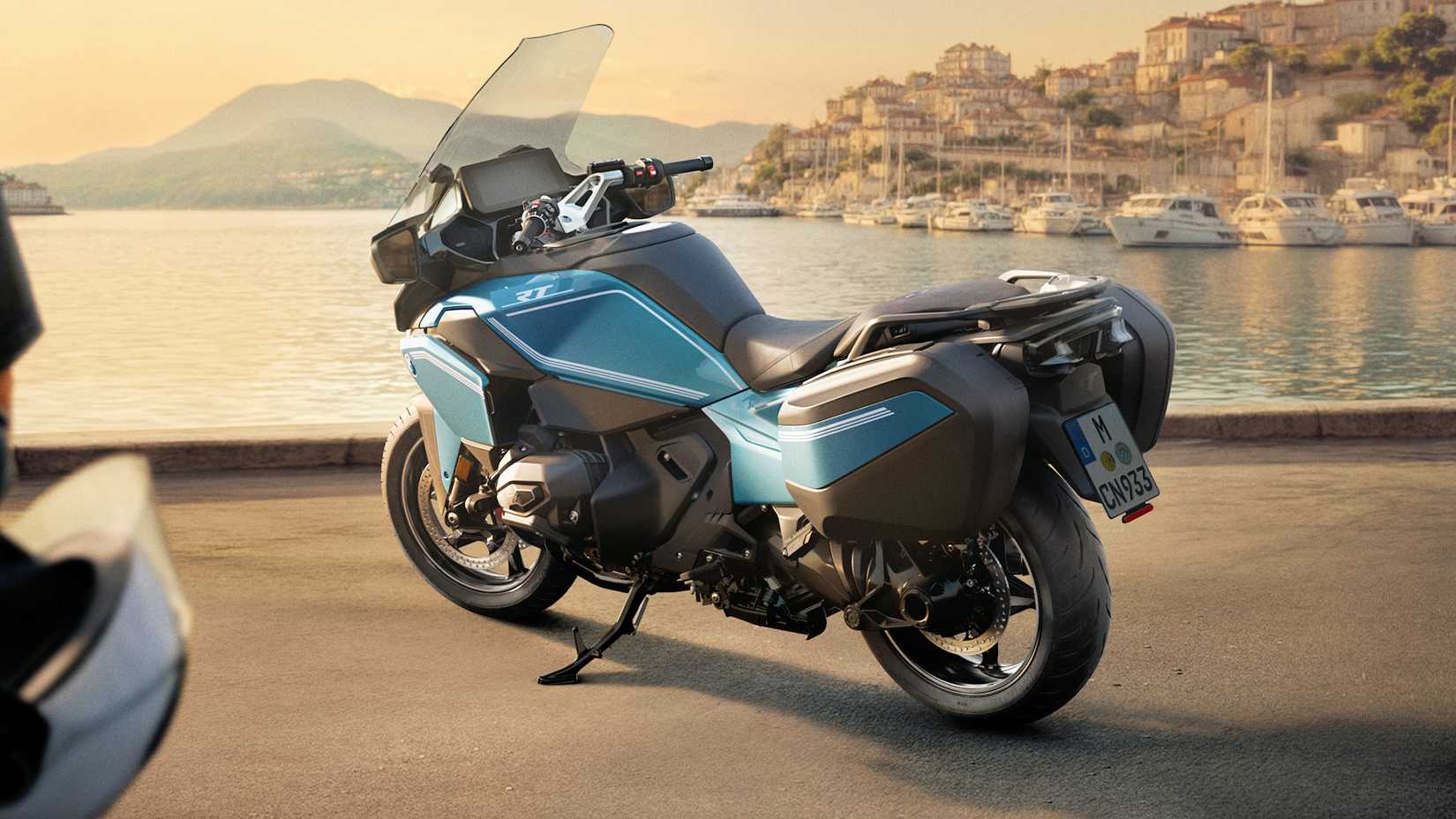 2026 BMW R 1300 RT parked curbside at a harbor