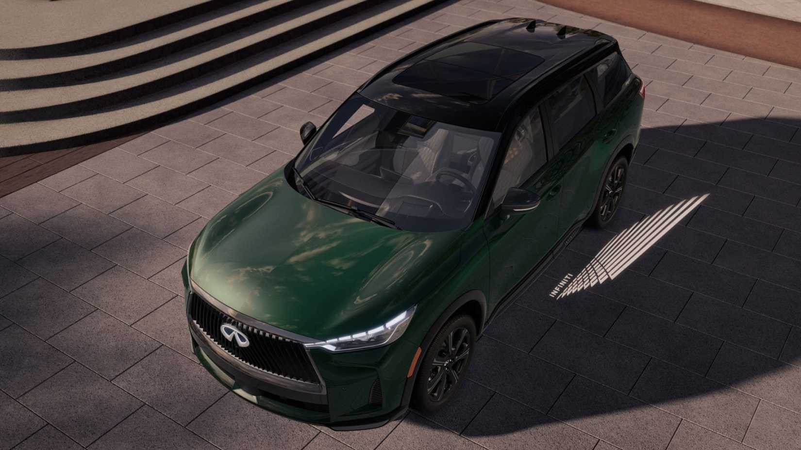 2026 Infiniti QX60 front third quarter ariel view