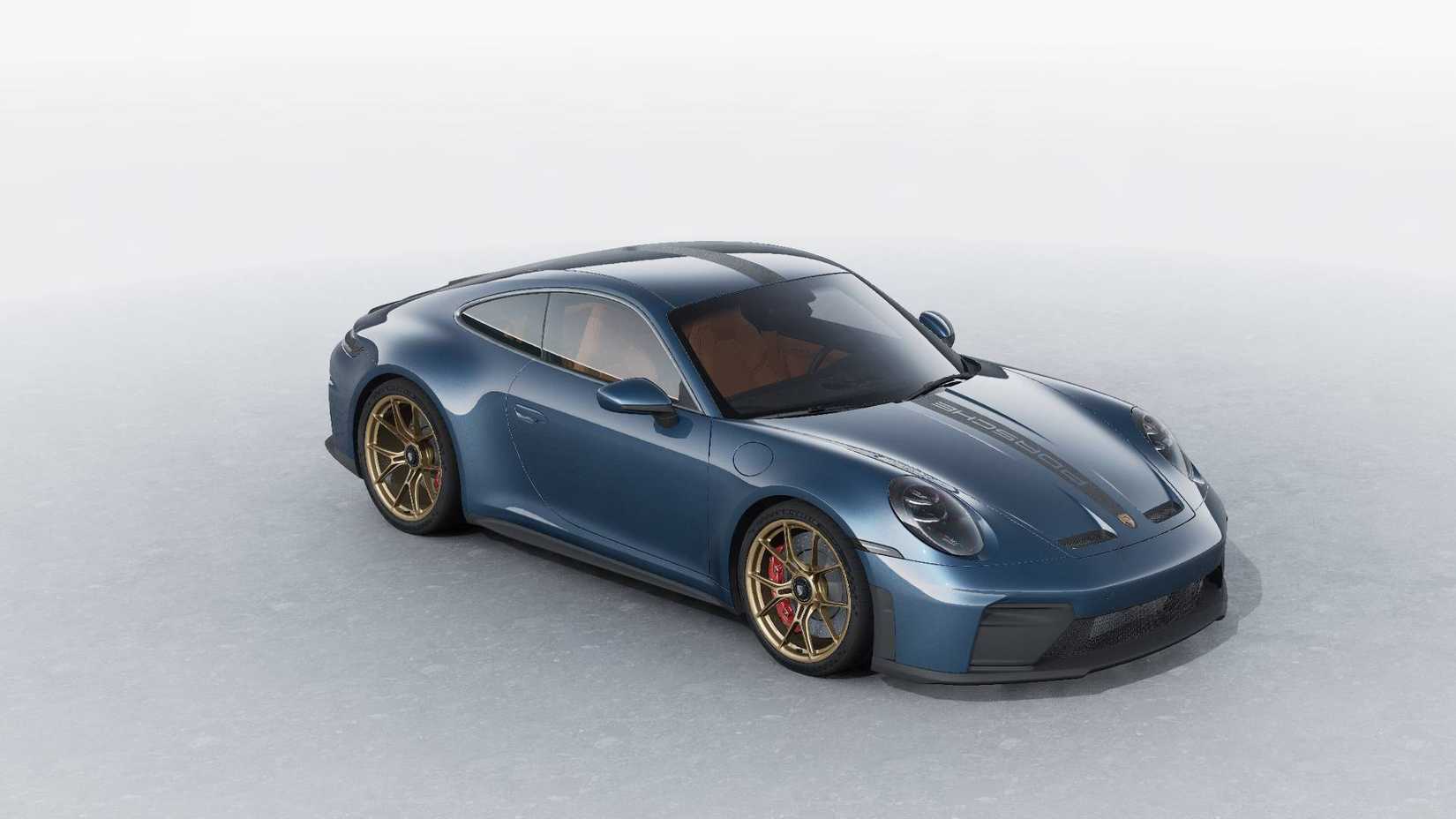 Vista frontal 3/4 de um Porsche 911 GT3 Touring 2026