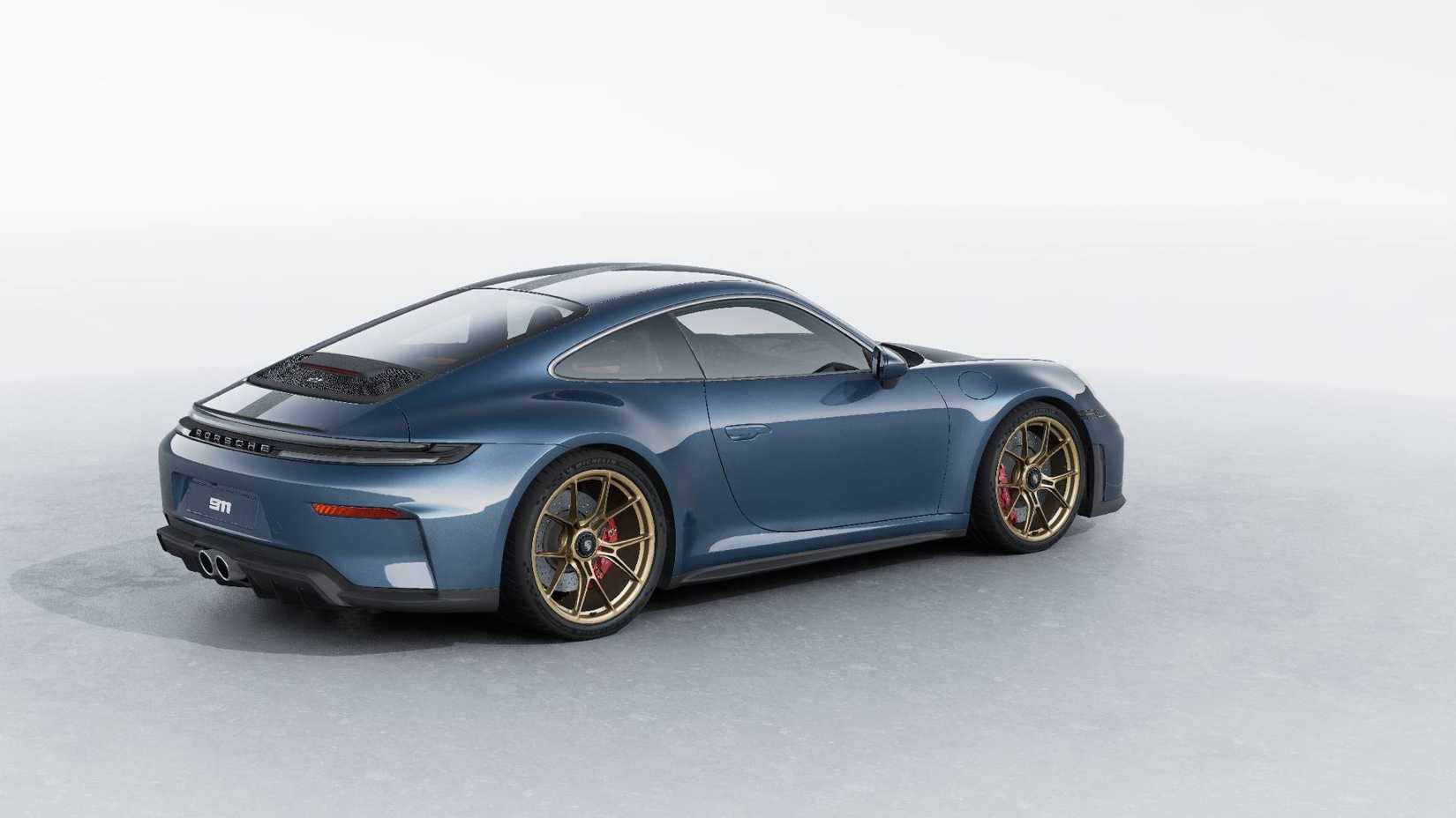 Rear 3/4 view of a 2026 Porsche 911 GT3 Touring