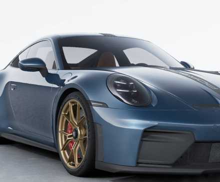 Vista lateral de um Porsche 911 GT3 Touring 2026