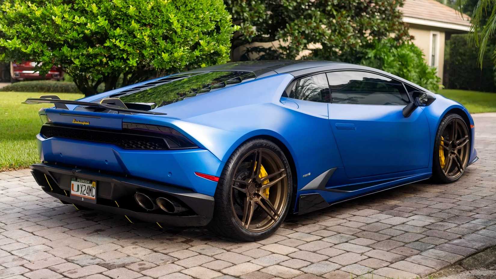 2015 Lamborghini Huracán LP610-4 traseiro 3/4 tiro