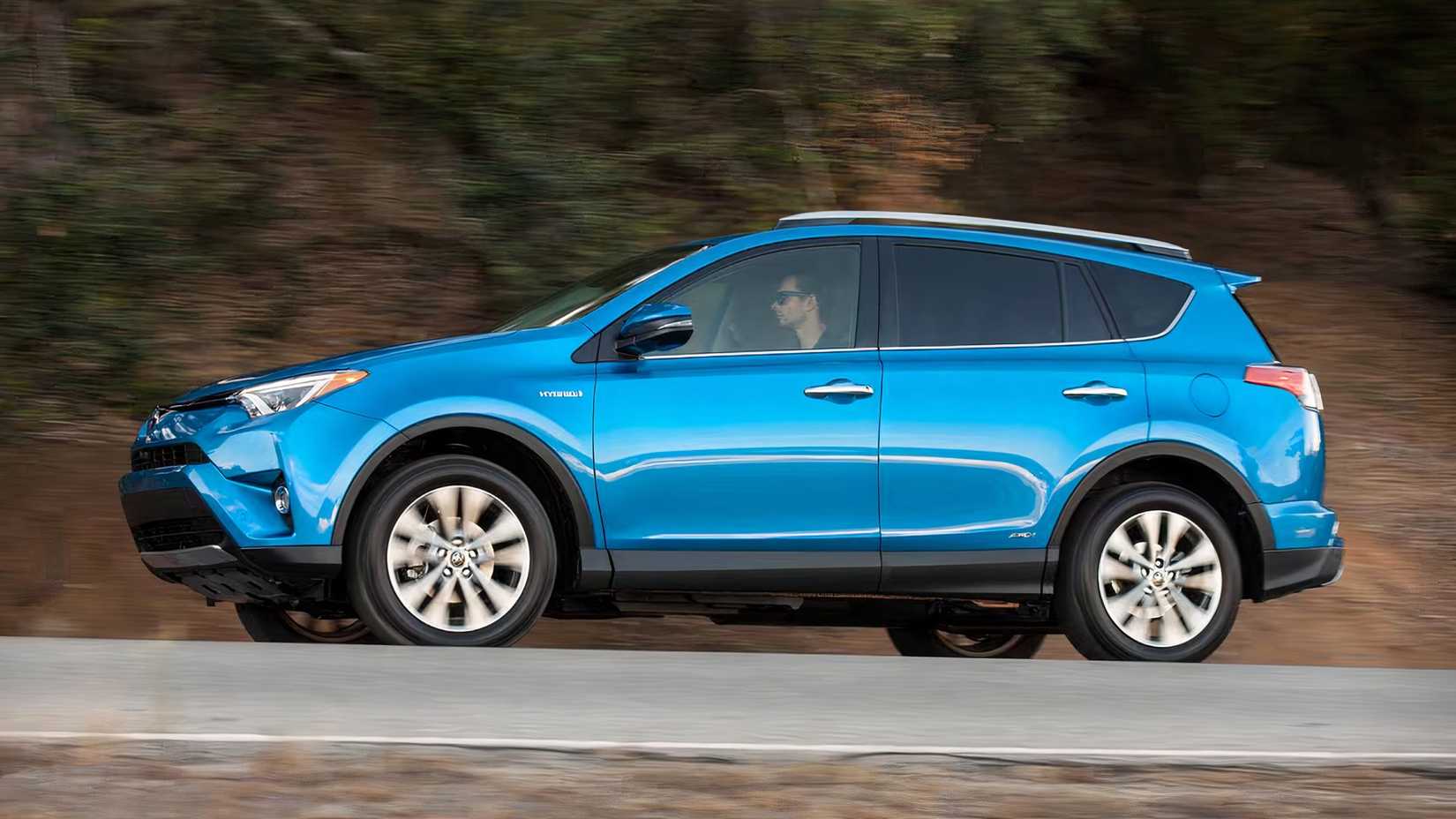 2018 Toyota RAV4 Hybrid in blue side 3/4 driving