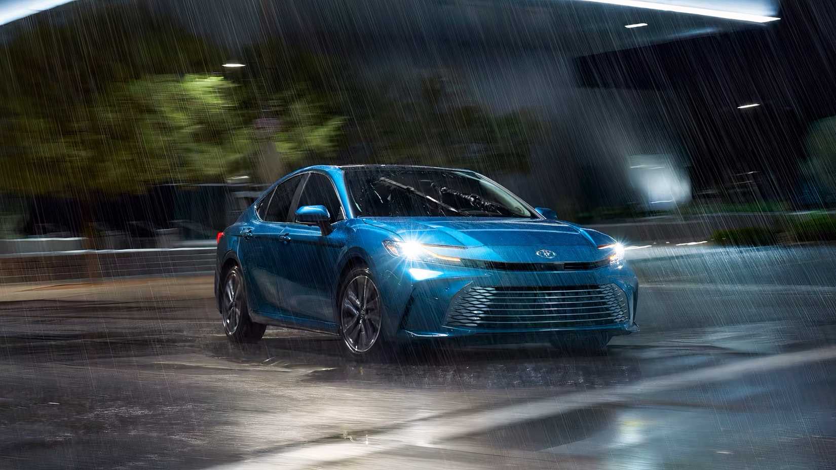 2026 Toyota Camry in blue being driven