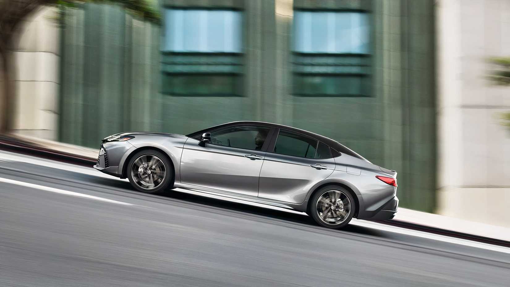 2026 Toyota Camry in silver being driven