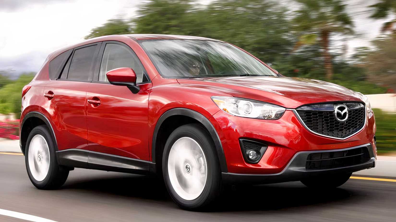 2015 Mazda CX-5 in red being driven