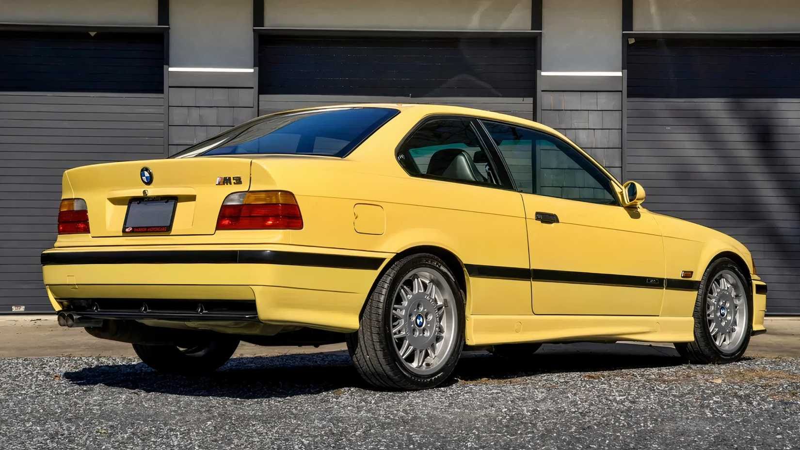 1995 BMW M3 in yellow parked