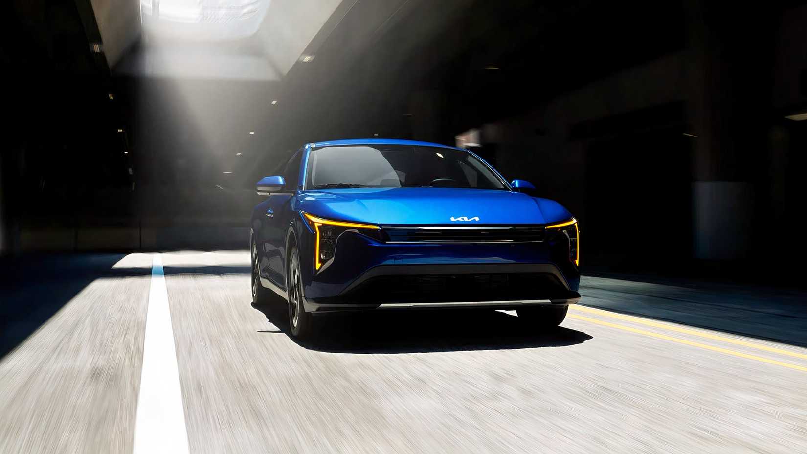 2026 Kia K4 EX front action shot