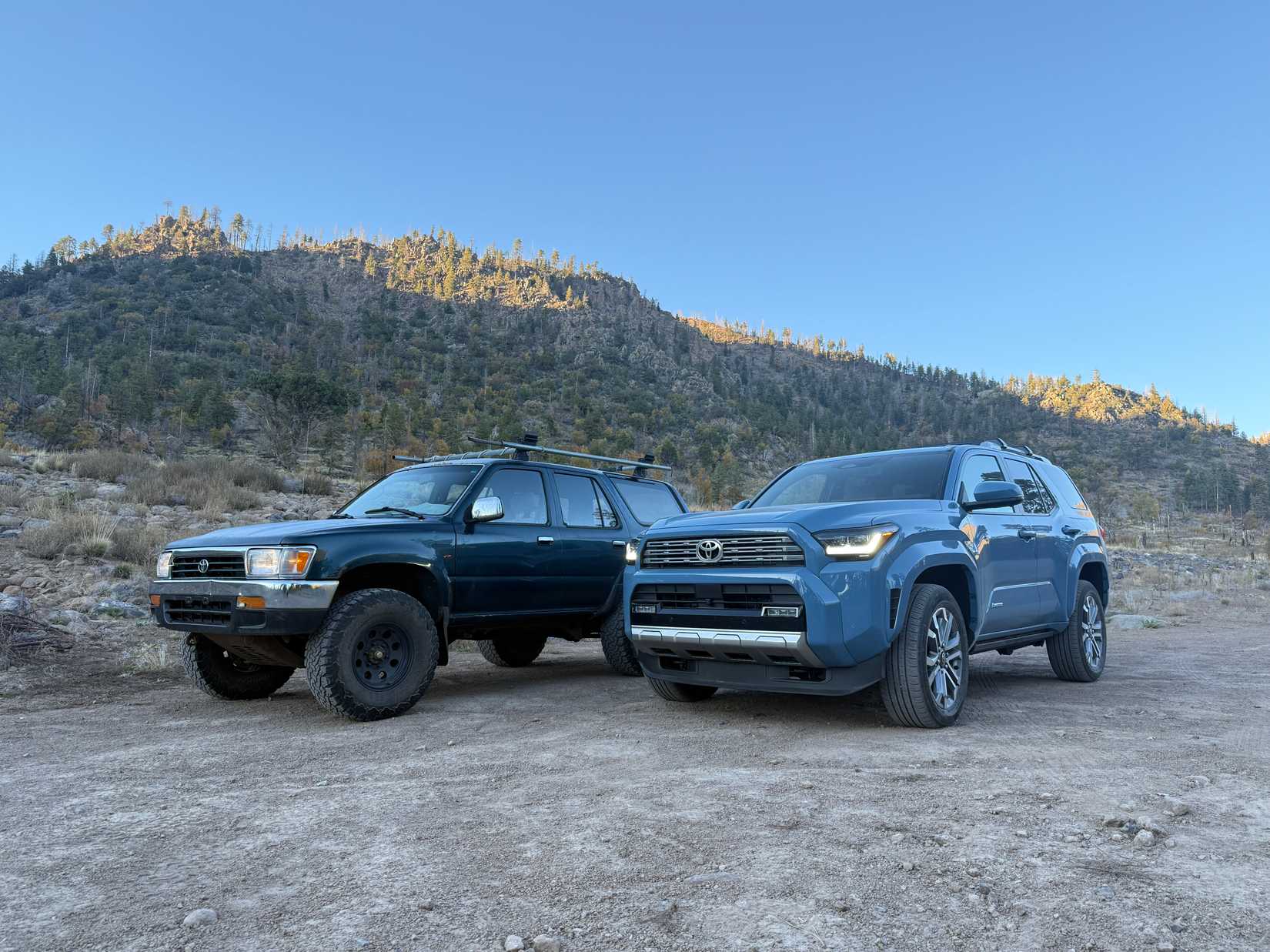 2025 Toyota 4Runner next to the 1995 Toyota 4Runner