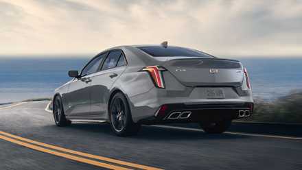 2026 Cadillac CT4-V rear third quarter accelerating view