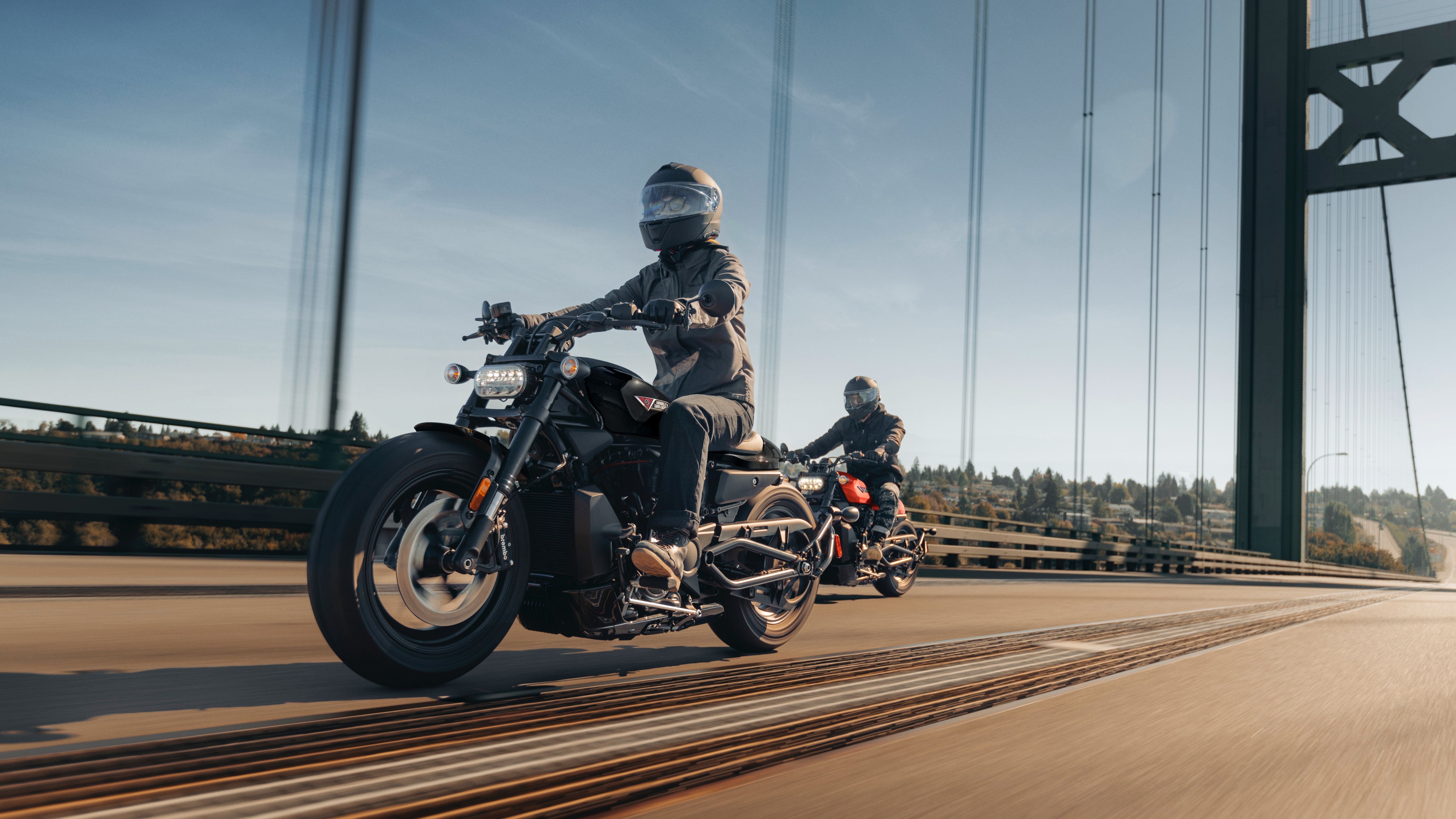 Tracking shot of a rider accelerating on a Harley-Davidson Sportster S