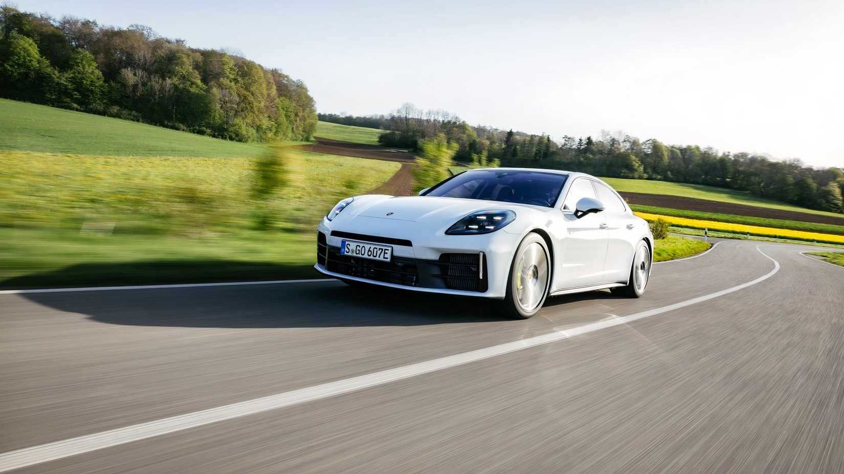 2026 Porsche Panamera 4 E-Hybrid driving front 3/4 view