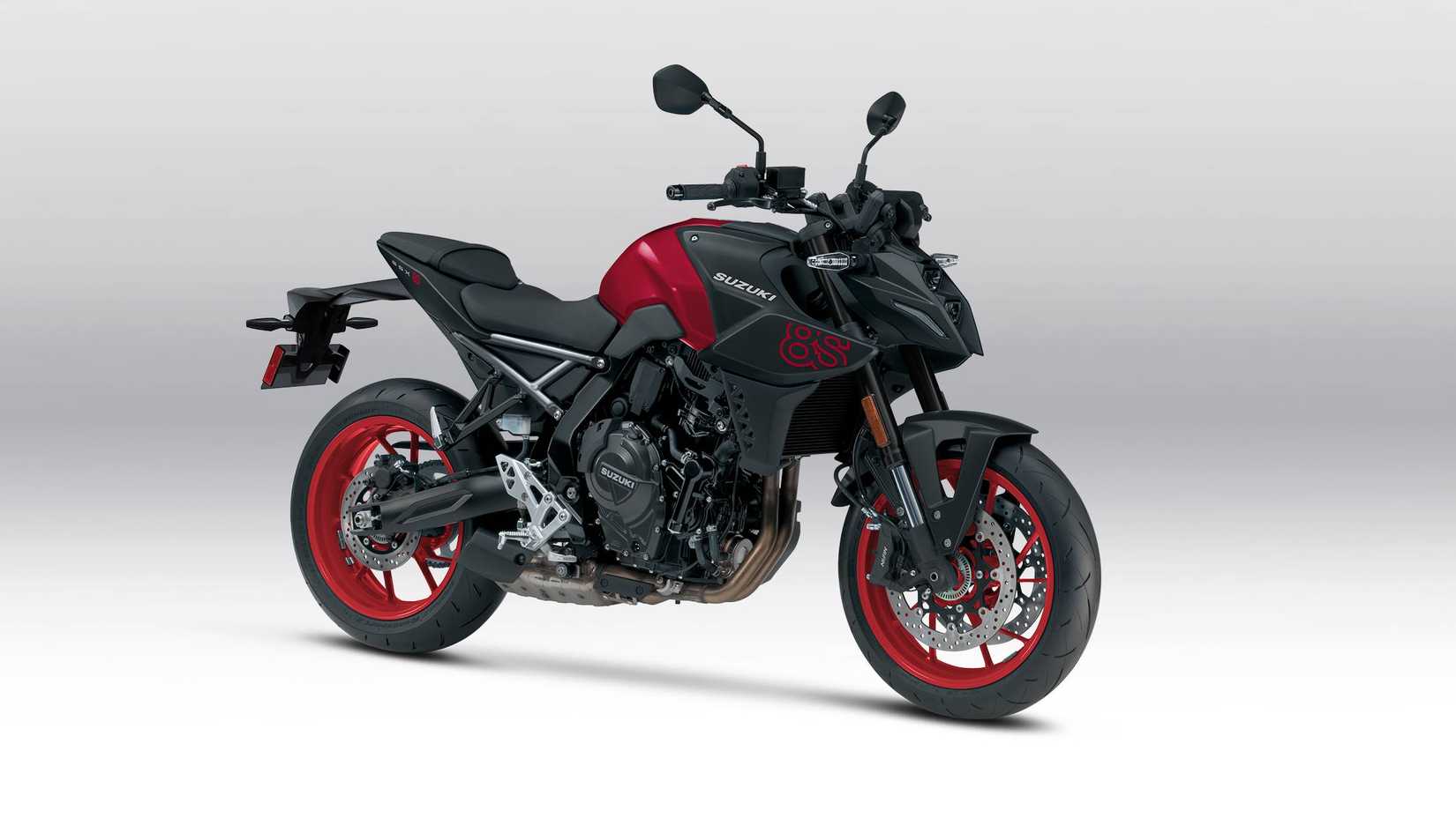 Foto de estúdio dos três quartos dianteiros do Suzuki GSX-8S vermelho e preto de 2026