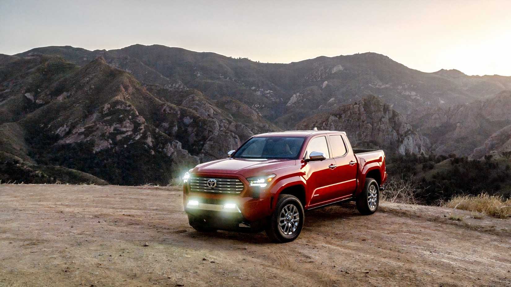 Front 3/4 shot of a 2026 Toyota Tacoma in front of sunset