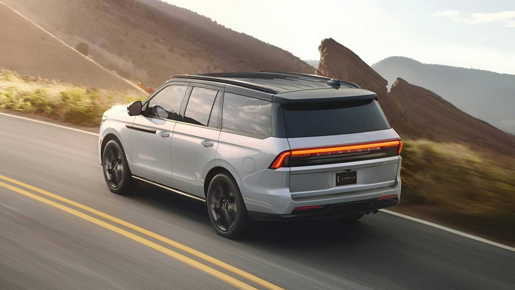 2026 Lincoln Navigator Black Label accelerating rear third quarter view