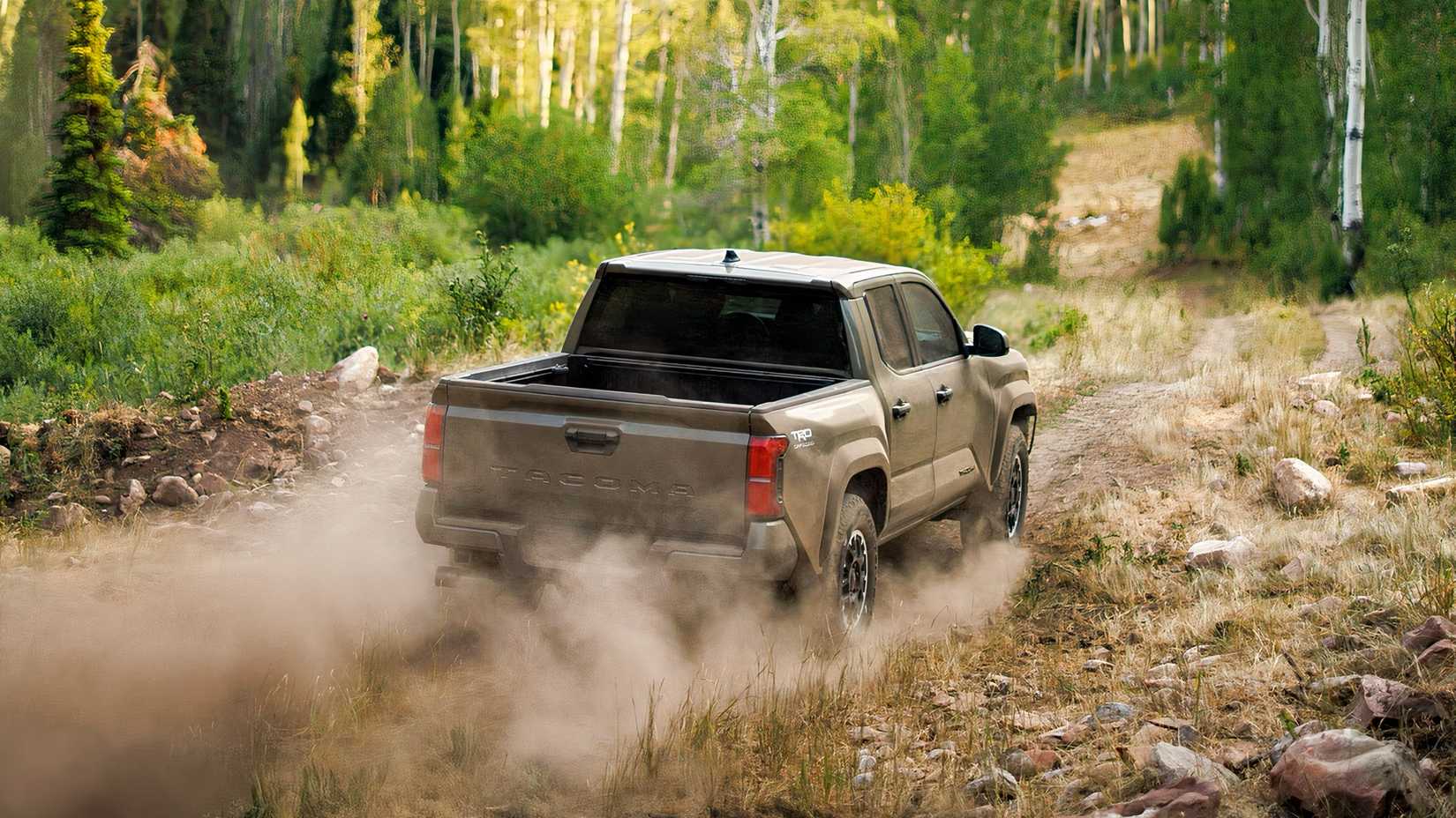 2026 Toyota Tacoma traseira 3/4 foto de ação