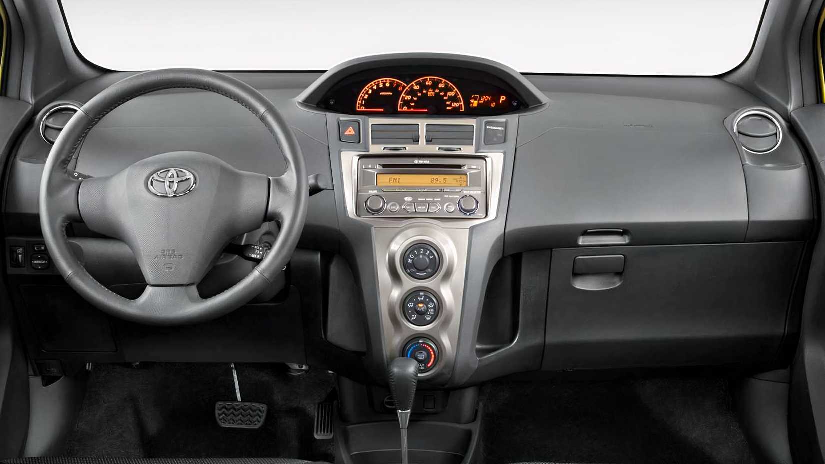 2009 Toyota Yaris Hatchback interior showing dashboard