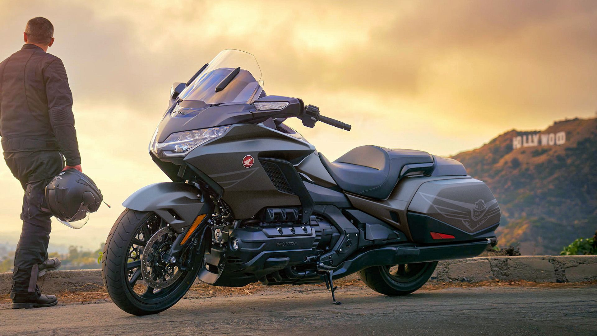 Rider next to a 2026 Honda Gold Wing parked in front of Hollywood sign