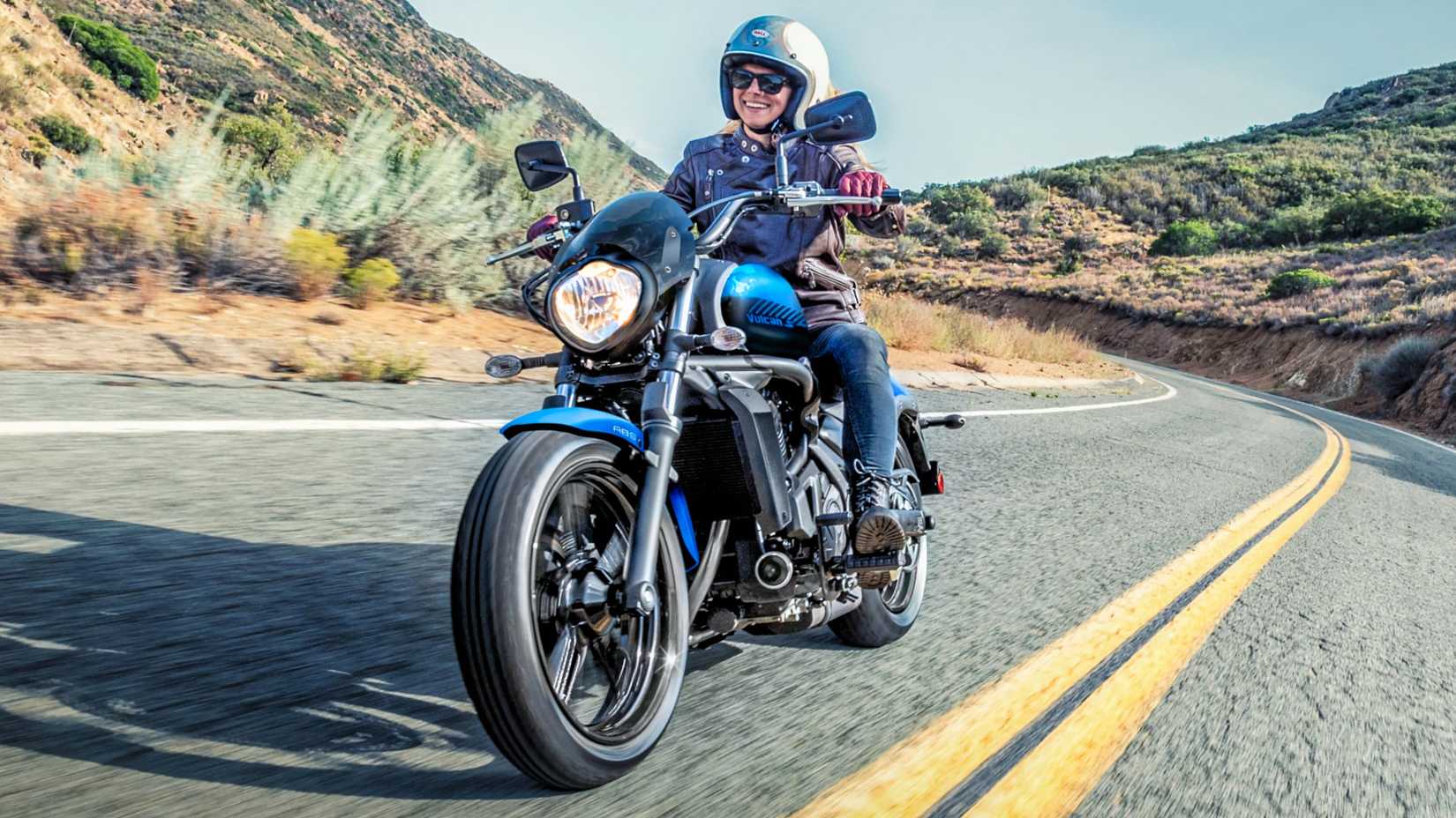 Rider on 2026 Kawasaki Vulcan S coming out of a curve